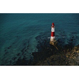 Umělecká fotografie Red and white lighthouse on the sea shore., Mykola  Romanovskyy, (40 x 26.7 cm)