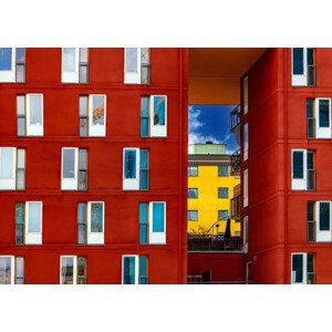 Fotografie Residential apartment buildings against cloudy sky, Milamai, 40x30 cm